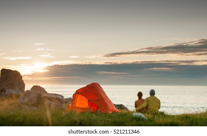 Couple Camping With Tent Near Seaside