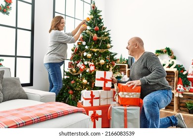 Couple celebrating christmas, very happy. Feeling in love - Powered by Shutterstock