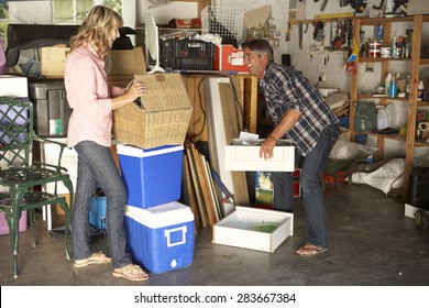 Couple Clearing Garage For Yard Sale
