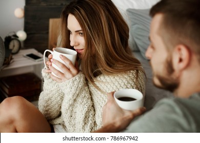 Couple With Coffee At Bedroom 