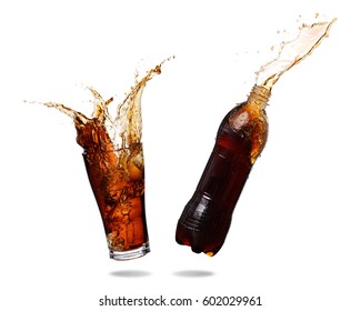 Couple cola splashing out of glass and bottle., Isolated white background. - Shutterstock ID 602029961