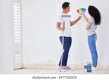 Couple, color planning and painting swatch in home, diy and house renovation or creative design. People, back and together for interior makeover in apartment, talk and choice to decorate or upgrade - Powered by Shutterstock