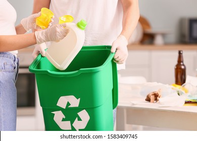 Couple with container for garbage at home. Concept of recycling - Powered by Shutterstock