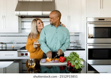 Couple cooking breakfast together at home - Powered by Shutterstock