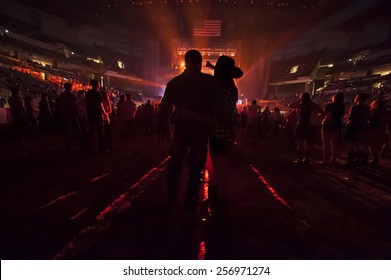 Couple at Country Music Concert - Shutterstock ID 256971274