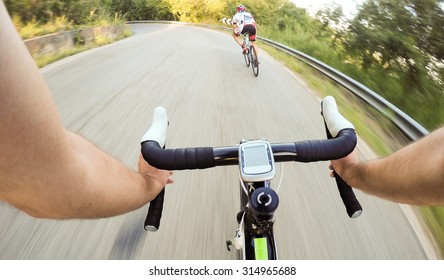 Couple Of Cyclist During A Cycling Road Race. Pov, Original Point Of View