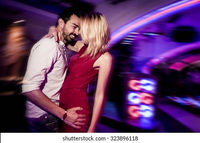 Couple Dancing In A Club