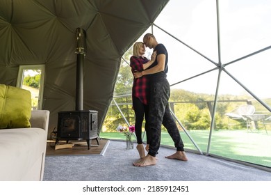 A Couple Dancing In Geo Dome Tents.