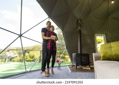 A Couple Dancing In Geo Dome Tents.