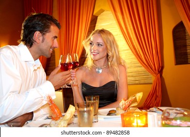 Couple Dining In A Fancy Restaurant