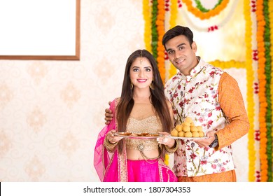Couple Diwali Festival Celebration & Shopping. Enjoying Diwali Festival at home. - Shutterstock ID 1807304353