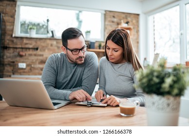 Couple Doing Finances At Home.