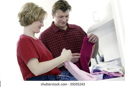 Couple Doing Laundry