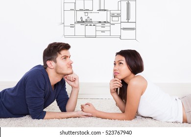 Couple Dreaming About New Kitchen