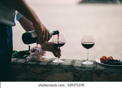 Couple Drink Wine At Sunset Beach. Montenegro