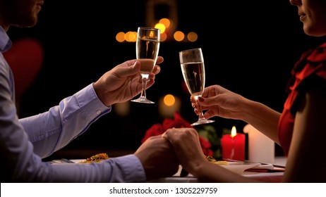 Couple Drinking Champagne In Restaurant, Romantic Date On St Valentines Day