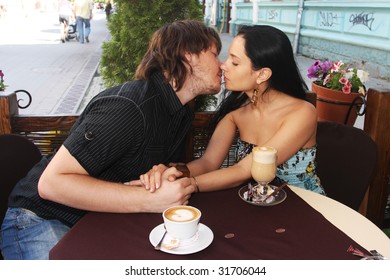 couple drinking coffee in cafe