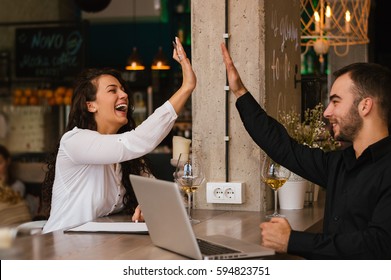 Couple Drinking Wine And Having Fun, High Five