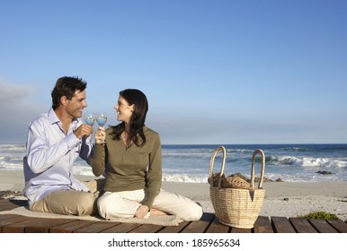 Couple Drinking Wine On Beach, Cape Town, South Africa