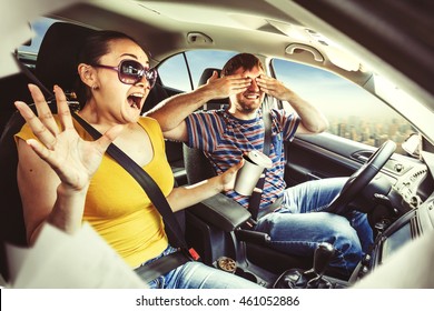Couple driving in the car