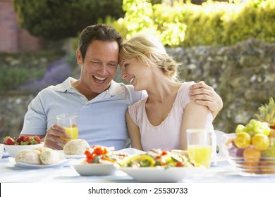 Couple Eating An Al Fresco Meal