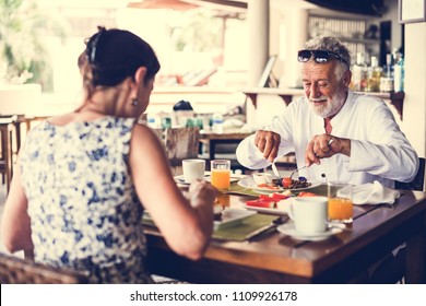 Couple eating a hotel breakfast
