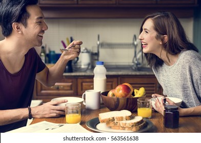 Couple Eating Morning Breakfast Togetherness - Powered by Shutterstock