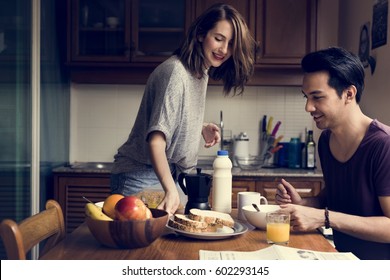 Couple Eating Morning Breakfast Togetherness - Powered by Shutterstock