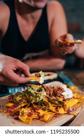 Couple Eating Street Tacos And Nachos At Outdoor Mexican Restaurant. Mexican Food.