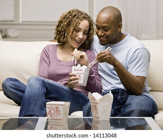 Couple Eating Take-out Chinese Food