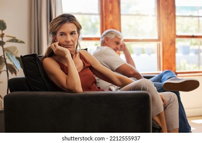 Couple, elderly and angry on sofa for argument, fight or dispute in home together. Stress, sad and frustrated with silence on couch in living room at house with senior, man and woman with depression - Powered by Shutterstock