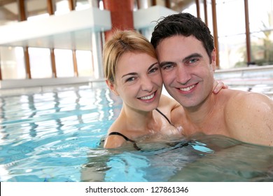 Couple Enjoying Bathtime In Spa Resort