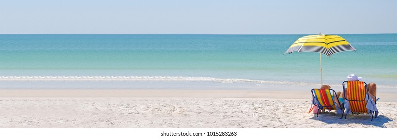 Couple Enjoying a Day at the Beach. Horizontal Banner with Copy Space