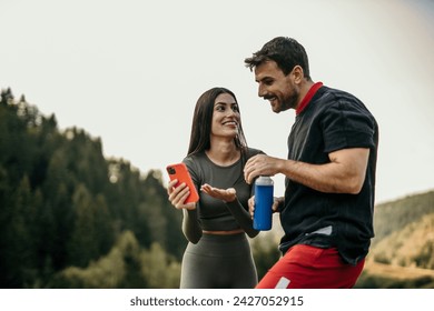 A couple enjoying each other's company after a jog - Powered by Shutterstock