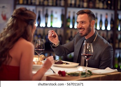 Couple enjoying in good food in restaurant 