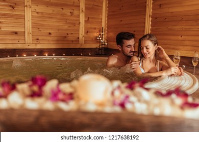 Couple enjoying in jacuzzi together