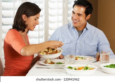 Couple Enjoying Meal At Home