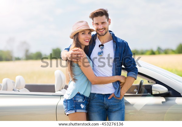 Couple enjoying a road\
trip together \
