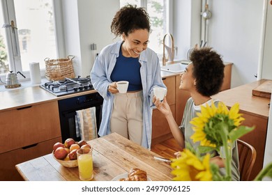 Couple enjoys coffee together, surrounded by warmth and laughter in their cozy kitchen. - Powered by Shutterstock