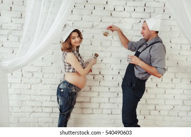 Couple Expecting A Baby - Painting Their New Home