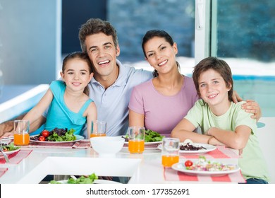 couple family lunch home, eating happy love smile, sitting at dinner table - Powered by Shutterstock