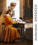 Couple, feather and writing a letter, royal and relax in home for history in noble palace. People, quill and bonding or notes in journal for plan, renaissance and aesthetic for support in marriage