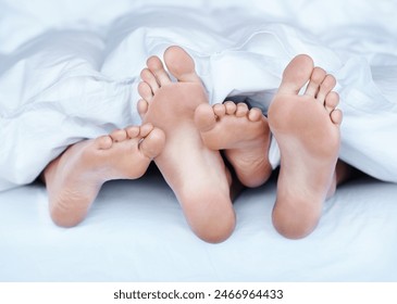 Couple, feet and sleeping in bed at home for peace, relax and resting together in weekend. House, bedroom and foot of people while bonding, loving and comfortable with love or trust in morning - Powered by Shutterstock