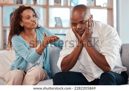Couple, fight and angry on sofa for marriage problems, conflict and bad communication. Divorce, argument and frustrated people in anger with man, woman and partner in living room for blame of affair