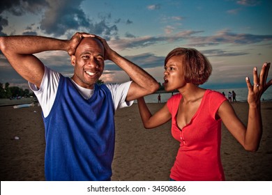 A Couple Fights Outside At Sunset