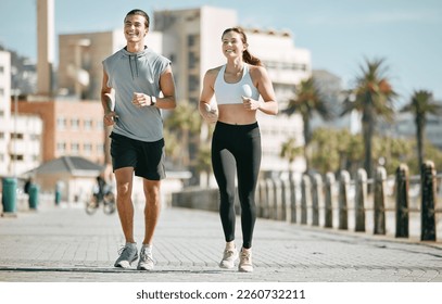 Couple, fitness and running together in the city for exercise, workout or cardio routine in Cape Town. Happy man and woman runner taking a walk or jog for healthy wellness or exercising outside - Powered by Shutterstock