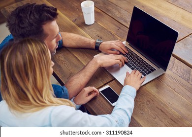 Couple Of Friends With Laptop At Cafe - Mockup