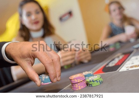 a couple and a game of poker