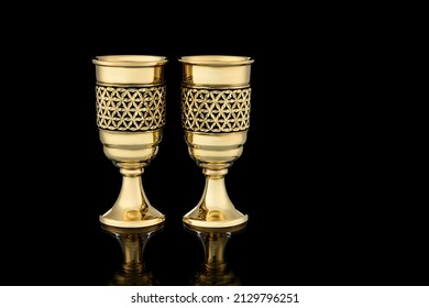 Couple Golden Antique Vintage Brass Shot Glass Gilded on black background. metal Wine Cup goblet with Carving Engraving pattern. - Shutterstock ID 2129796251
