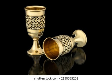 Couple Golden Antique Vintage Brass Shot Glass Gilded on black background. metal Wine Cup goblet with Carving Engraving pattern. - Shutterstock ID 2130335201